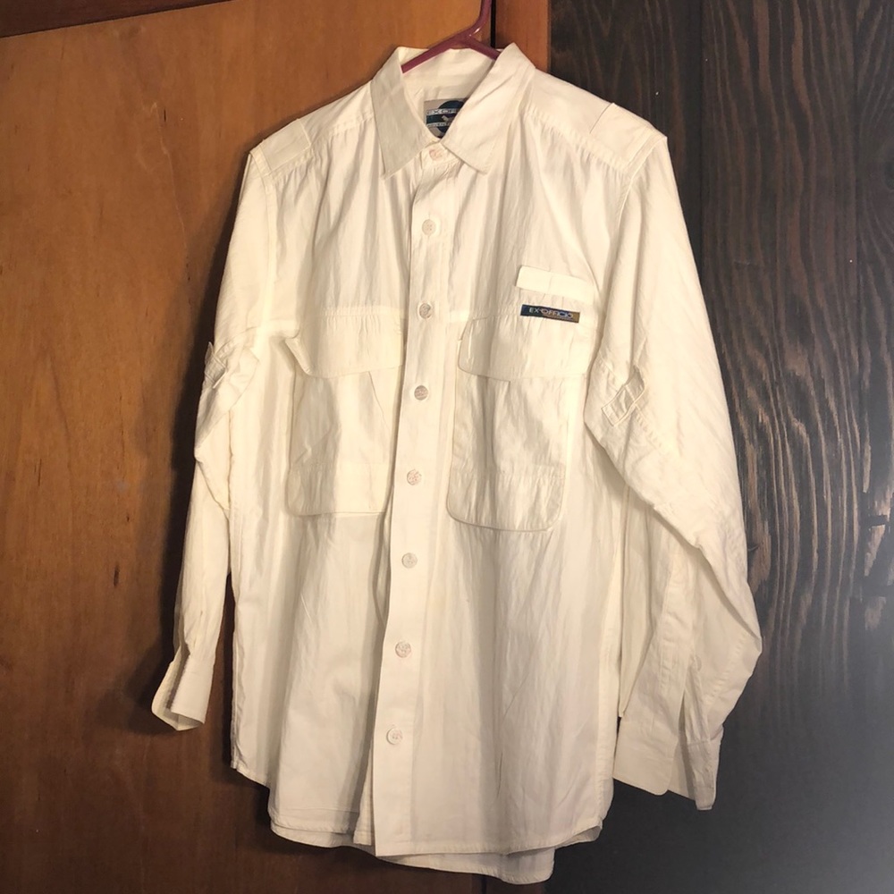 Ex officio, white button down shirt slight discoloration on collar.